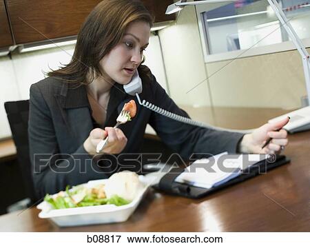 Close-up of a businesswoman talking on the telephone View Large Photo Image Stock Photo - Close-up of a businesswoman talking on the telephone. Fotosearch