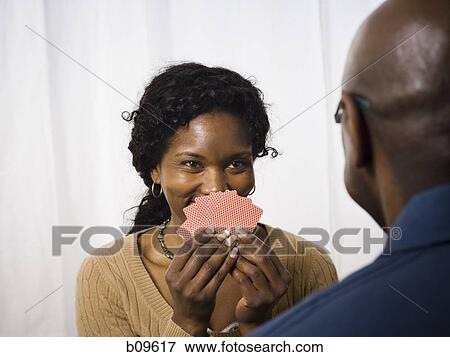 Close-up of a mature couple playing cards View Large Photo Image Stock Photo - Close-up of a mature couple playing cards. Fotosearch