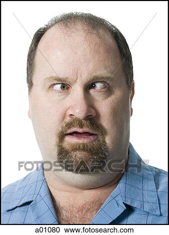 Close-up of a mature man looking cross eyed View Large Photo Image Stock Image - Close-up of a mature man looking cross eyed. Fotosearch
