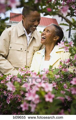Close-up of a senior man and a senior woman looking at each other View Large Photo Image Stock Photography - Close-up of a senior man and a senior woman looking at each other. Fotosearch