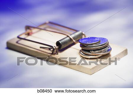 Close-up of a stack of coins on a mousetrap View Large Photo Image Stock Image - Close-up of a stack of coins on a mousetrap. Fotosearch