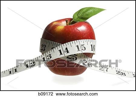 Close-up of a tape measure around an apple View Large Photo Image Stock Image - Close-up of a tape measure around an apple. Fotosearch