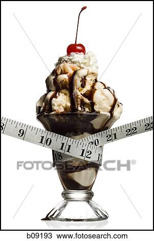 Close-up of a tape measure around an ice-cream View Large Photo Image Stock Image - Close-up of a tape measure around an ice-cream. Fotosearch
