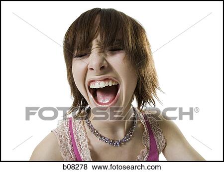 Close-up of a teenage girl shouting View Large Photo Image Stock Photo - Close-up of a teenage girl shouting. Fotosearch