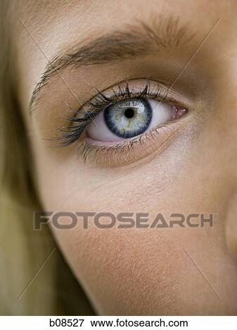 Close-up of a teenage girl's eye View Large Photo Image Stock Photo - Close-up of a teenage girl's eye. Fotosearch