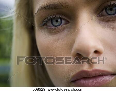 Close-up of a teenage girl's face View Large Photo Image Stock Photo - Close-up of a teenage girl's face. Fotosearch