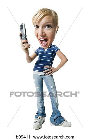 Close-up of a young woman holding a mobile phone View Large Photo Image Stock Image - Close-up of a young woman holding a mobile phone. Fotosearch