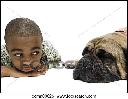 Stock Photography - Close-up of boy and dog. Fotosearch