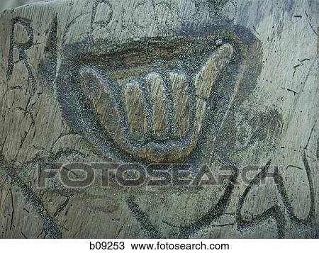 Close-up of carvings on a rock View Large Photo Image Stock Image - Close-up of carvings on a rock. Fotosearch