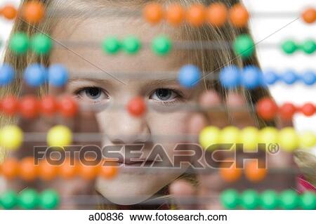 Close-up of child with counting beads View Large Photo Image Stock Photograph - Close-up of child with counting beads. Fotosearch