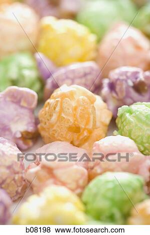 Close-up of colorful caramel corn View Large Photo Image Stock Photo - Close-up of colorful caramel corn. Fotosearch