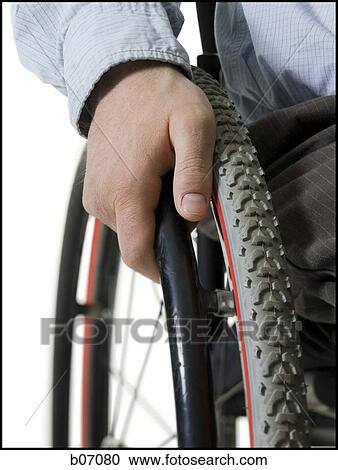 Close-up of hand on wheel of wheelchair View Large Photo Image Stock Image - Close-up of hand on wheel of wheelchair. Fotosearch