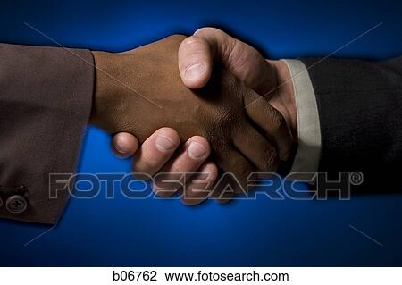 Stock Image - Close-up of handshake. Fotosearch