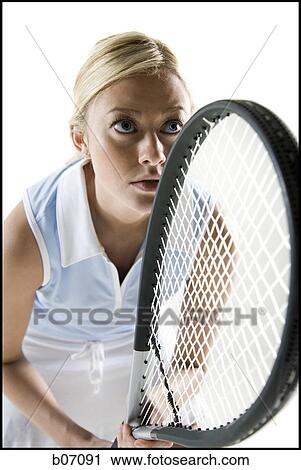 Close-up of tennis player with racket View Large Photo Image Stock Image - Close-up of tennis player with racket. Fotosearch