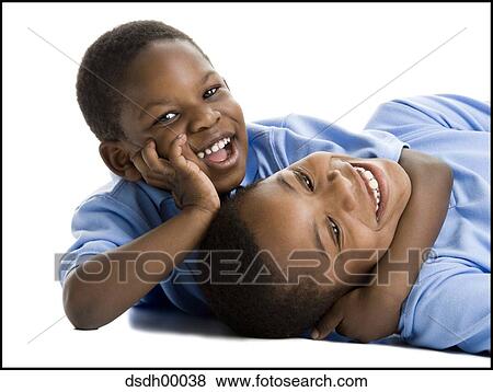 Stock Photo - Close-up of two boys smiling. Fotosearch