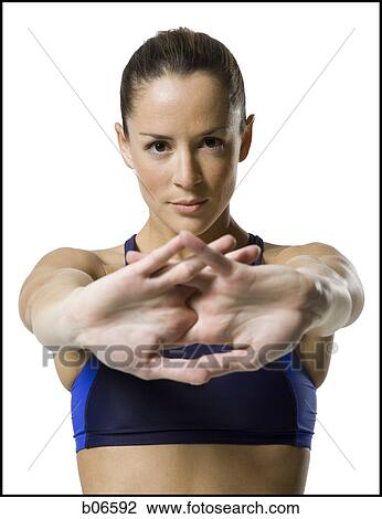 Close-up of woman athlete stretching arms View Large Photo Image Stock Image - Close-up of woman athlete stretching arms. Fotosearch