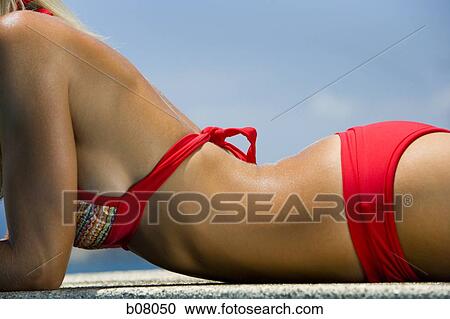 Close-up of woman in red bikini View Large Photo Image Stock Image - Close-up of woman in red bikini. Fotosearch