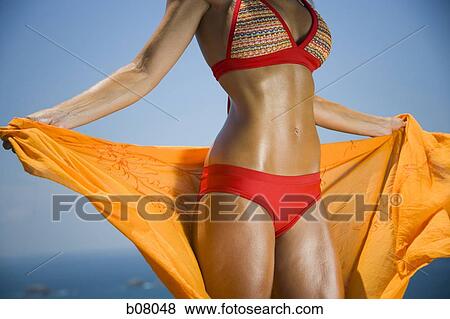 Close-up of woman in red bikini View Large Photo Image Stock Photo - Close-up of woman in red bikini. Fotosearch