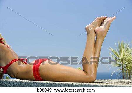 Close-up of woman in red bikini View Large Photo Image Stock Photo - Close-up of woman in red bikini. Fotosearch