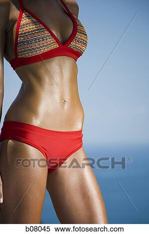 Close-up of woman in red bikini View Large Photo Image Stock Photography - Close-up of woman in red bikini. Fotosearch