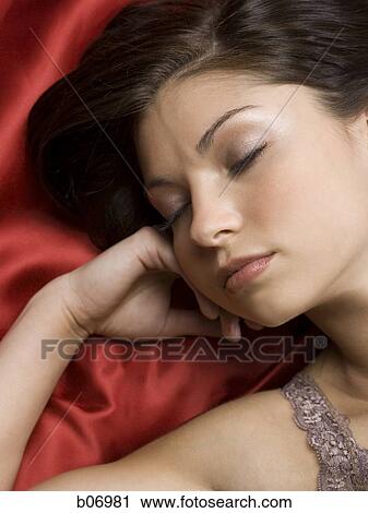 Close-up of woman sleeping View Large Photo Image Stock Image - Close-up of woman sleeping. Fotosearch