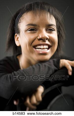 Stock Image - Closeup of girl smiling. Fotosearch