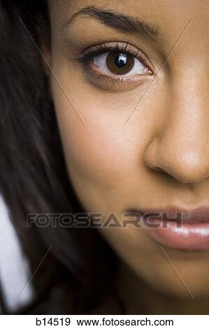 Closeup of woman with brown eyes View Large Photo Image Stock Photo - Closeup of woman with brown eyes. Fotosearch