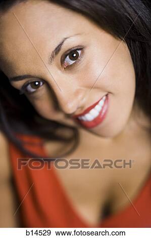 Stock Photo - Closeup of woman with red lipstick smiling. Fotosearch