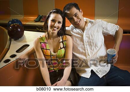 Couple at bowling alley View Large Photo Image Stock Image - Couple at bowling alley. Fotosearch
