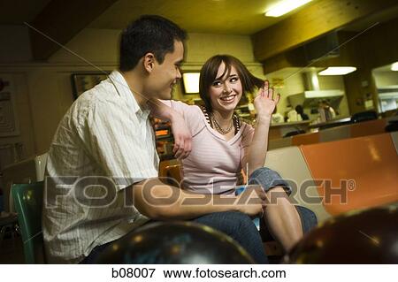 Couple at bowling alley View Large Photo Image Stock Photo - Couple at bowling alley. Fotosearch