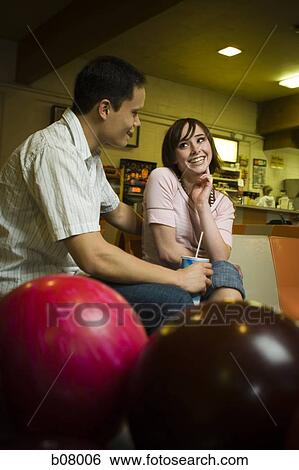Couple at bowling alley View Large Photo Image Stock Photograph - Couple at bowling alley. Fotosearch