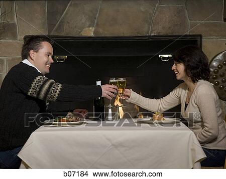 Picture - Couple dining in restaurant. Fotosearch