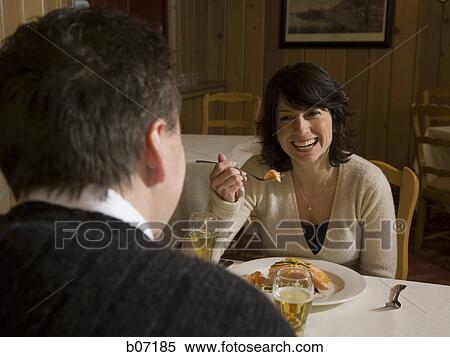 Couple dining in restaurant View Large Photo Image Stock Photography - Couple dining in restaurant. Fotosearch