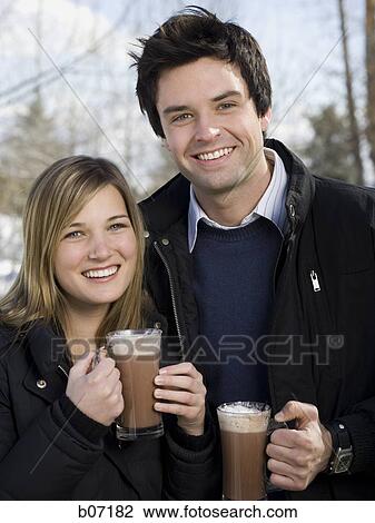 Couple drinking hot chocolate View Large Photo Image Stock Image - Couple drinking hot chocolate. Fotosearch