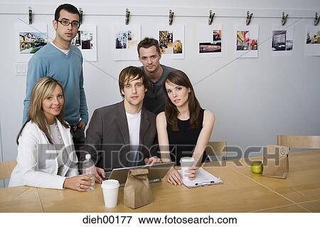 Stock Photo - Creative agency staff meeting. Fotosearch