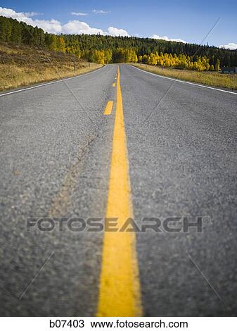 Deserted two lane highway View Large Photo Image Stock Image - Deserted two lane highway. Fotosearch