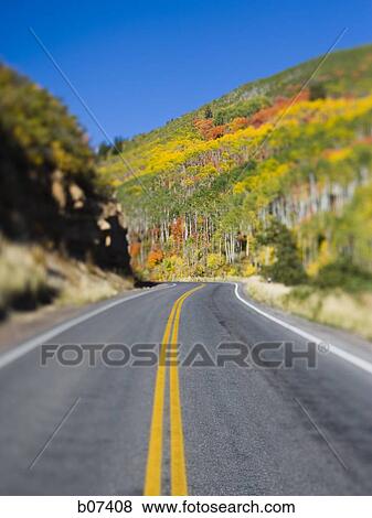 Deserted two lane highway View Large Photo Image Stock Photo - Deserted two lane highway. Fotosearch
