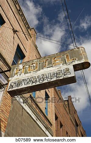 Stock Photo - Dilapidated old hotel sign. Fotosearch