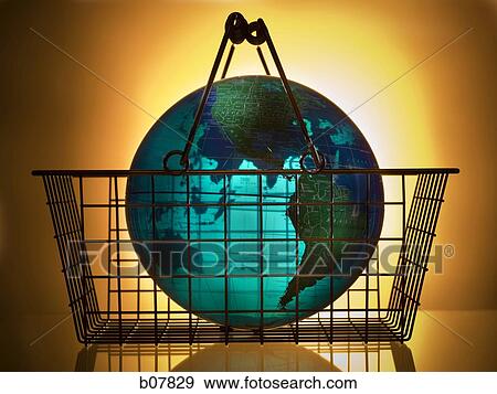 Earth globe in a shopping hand basket View Large Photo Image Stock Photo - Earth globe in a shopping hand basket. Fotosearch