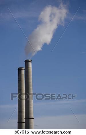 Factory smoke stacks View Large Photo Image Stock Photography - Factory smoke stacks. Fotosearch