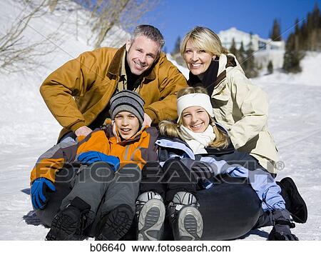 Family portrait on inner tube View Large Photo Image Stock Image - Family portrait on inner tube. Fotosearch
