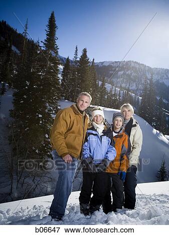 Family portrait on snowy hillside View Large Photo Image Stock Photo - Family portrait on snowy hillside. Fotosearch