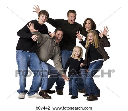 Family posing for portrait View Large Photo Image Stock Image - Family posing for portrait. Fotosearch