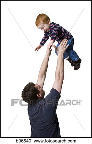 Father playing with son View Large Photo Image Stock Image - Father playing with son. Fotosearch