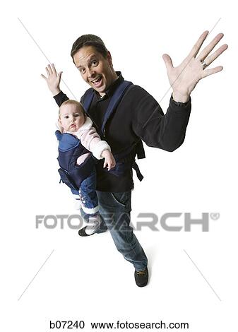 Father with baby in pouch View Large Photo Image Stock Image - Father with baby in pouch. Fotosearch