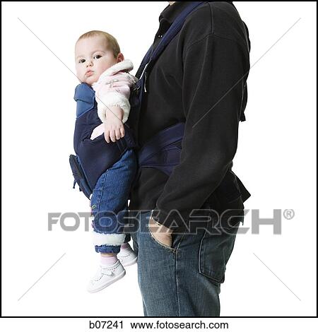 Father with baby in pouch View Large Photo Image Stock Image - Father with baby in pouch. Fotosearch