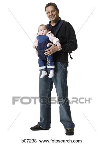 Father with baby in pouch View Large Photo Image Stock Photo - Father with baby in pouch. Fotosearch