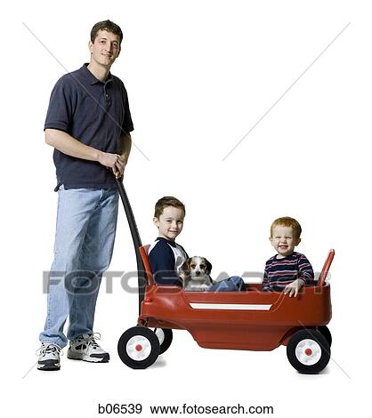 Father with sons and toy wagon View Large Photo Image Stock Photo - Father with sons and toy wagon. Fotosearch