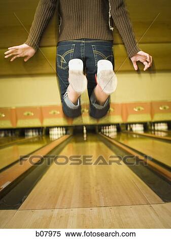 Female bowler celebrating a strike View Large Photo Image Stock Photography - Female bowler celebrating a strike. Fotosearch