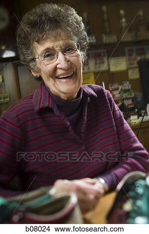 Picture - Female bowling attendant. Fotosearch